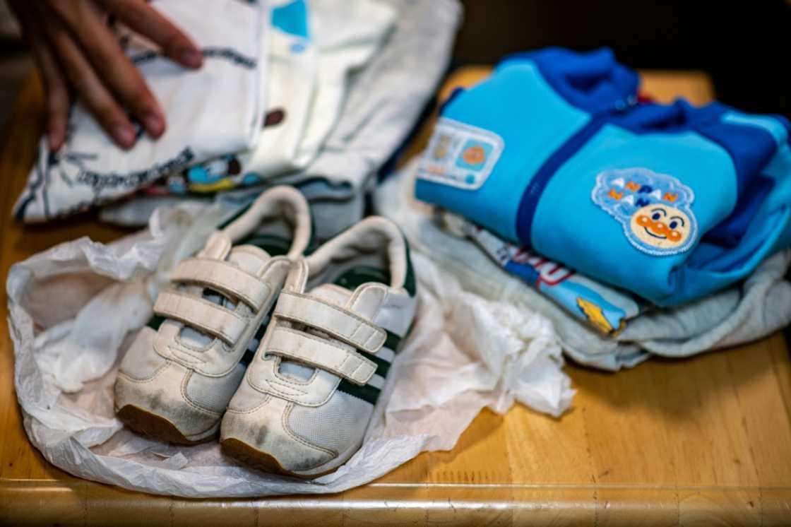 The clothes he was wearing when he was abandoned as a toddler are the 'oldest memories I have of my childhood', says 18-year-old Kiochi Miyatsu The clothes he was wearing when he was abandoned as a toddler are the 'oldest memories I have of my childhood', says 18-year-old Kiochi Miyatsu