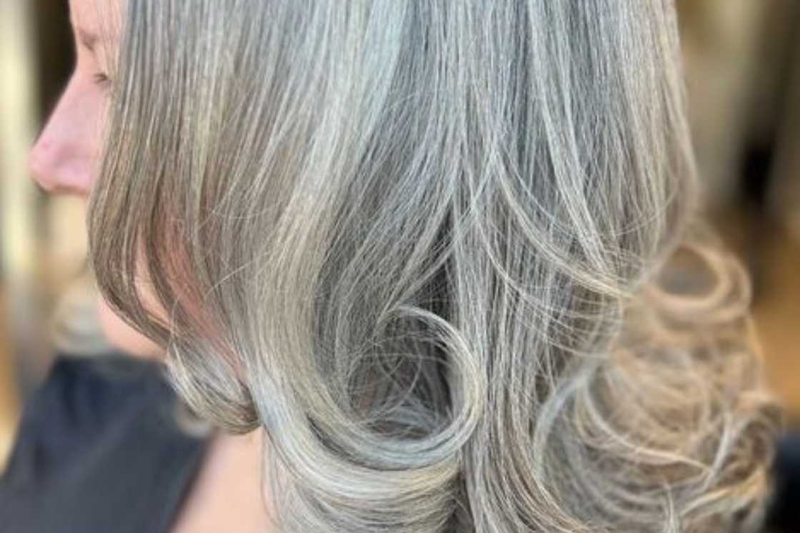 A grey mid-length hair with flicked ends A grey mid-length hair with flicked ends