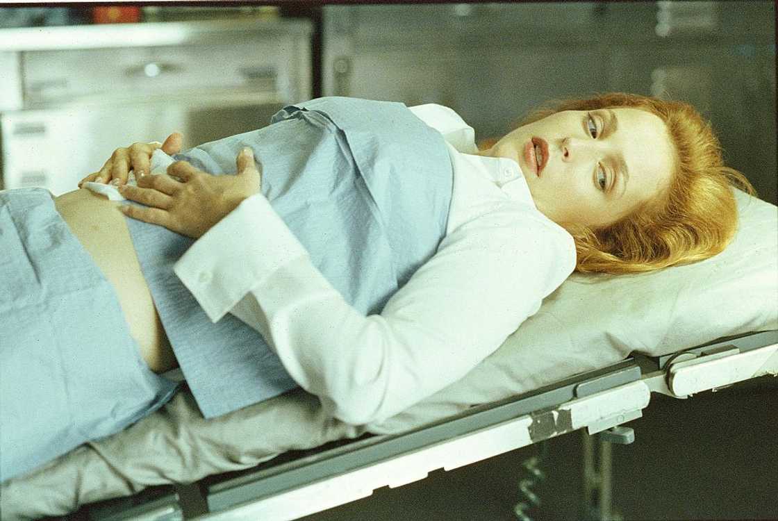 Dana Scully (Gillian Anderson) undergoes testing regarding her pregnancy Dana Scully (Gillian Anderson) undergoes testing regarding her pregnancy
