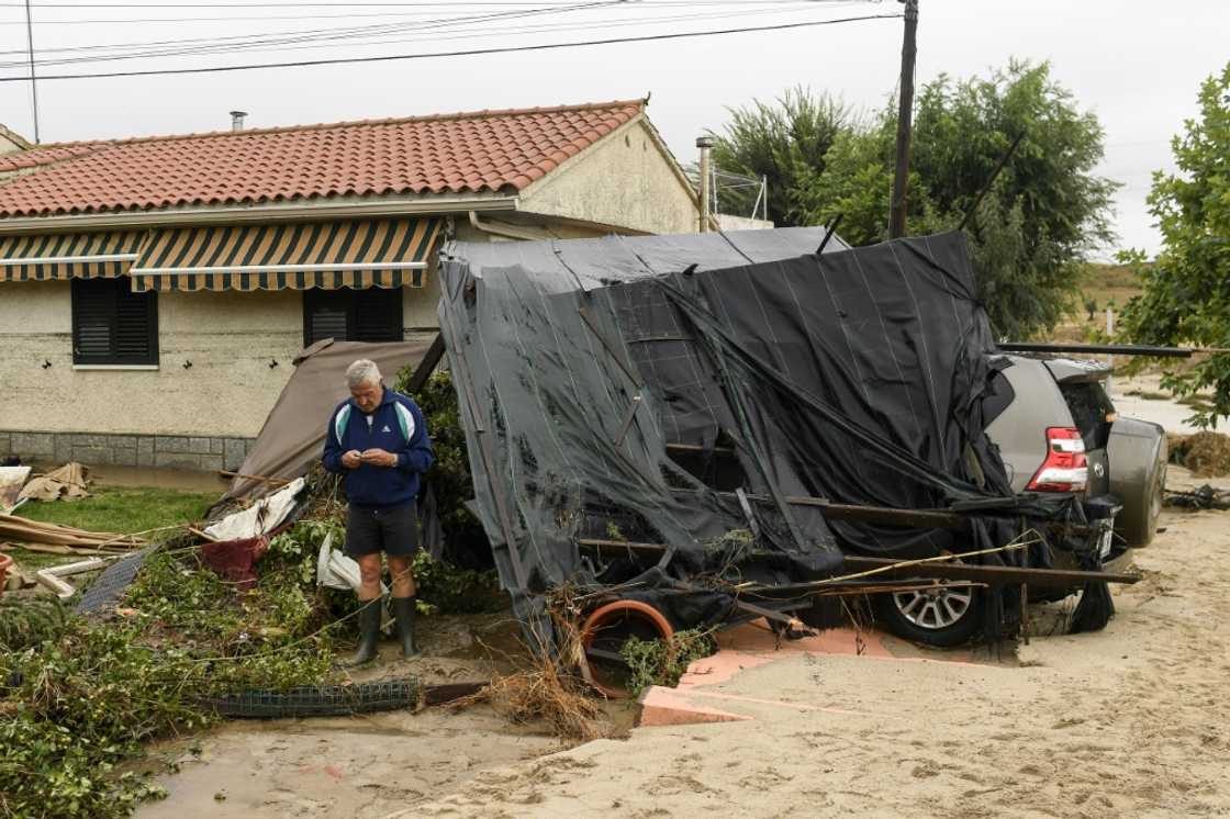 Rubble in front of a house in the flood-hit town of Aldea del Fresno