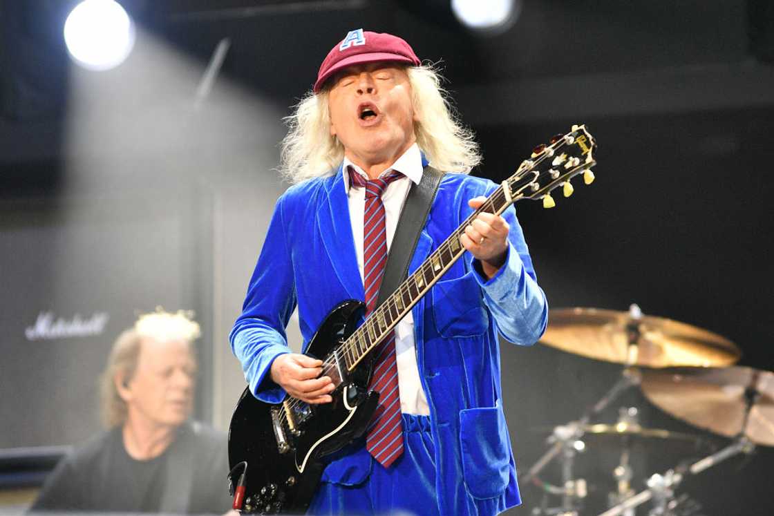 Angus Young of AC/DC performs during the PWR UP Tour Angus Young of AC/DC performs during the PWR UP Tour