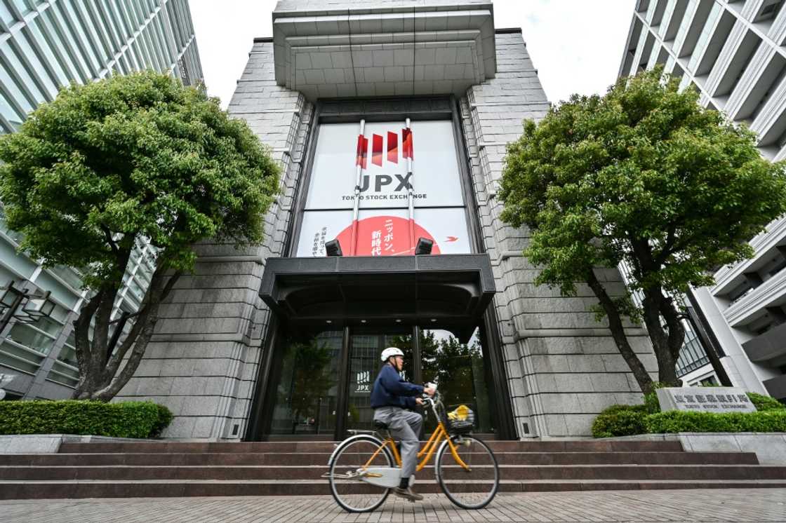 Japanese markets started higher on Friday with Tokyo's benchmark Nikkei 225 index crossing new record heights