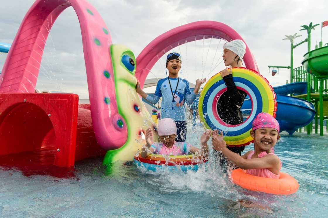 Children play at the newly opened Myongsasimni Water Park in the Wonsan Kalma Coastal Tourist Area in North Korea Children play at the newly opened Myongsasimni Water Park in the Wonsan Kalma Coastal Tourist Area in North Korea
