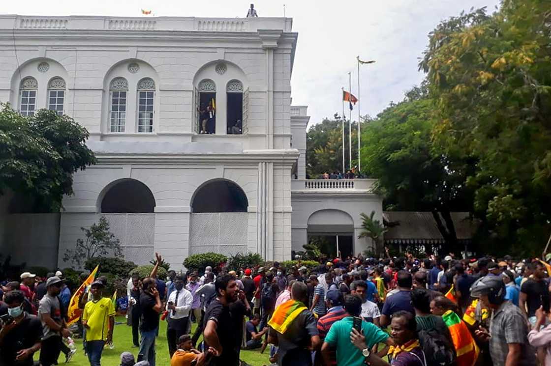 Sri Lanka's President Gotabaya Rajapaksa fled his official residence shortly before protesters stormed and overran the compound Sri Lanka's President Gotabaya Rajapaksa fled his official residence shortly before protesters stormed and overran the compound