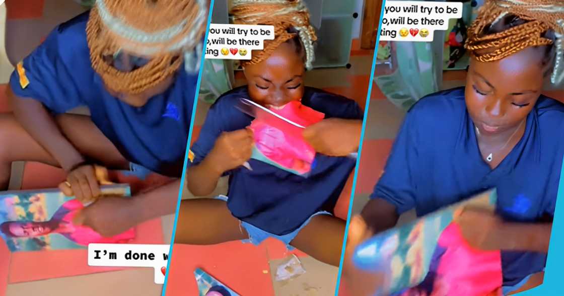 Ghanaian lady destroys boyfriend's picture in her room Ghanaian lady destroys boyfriend's picture in her room