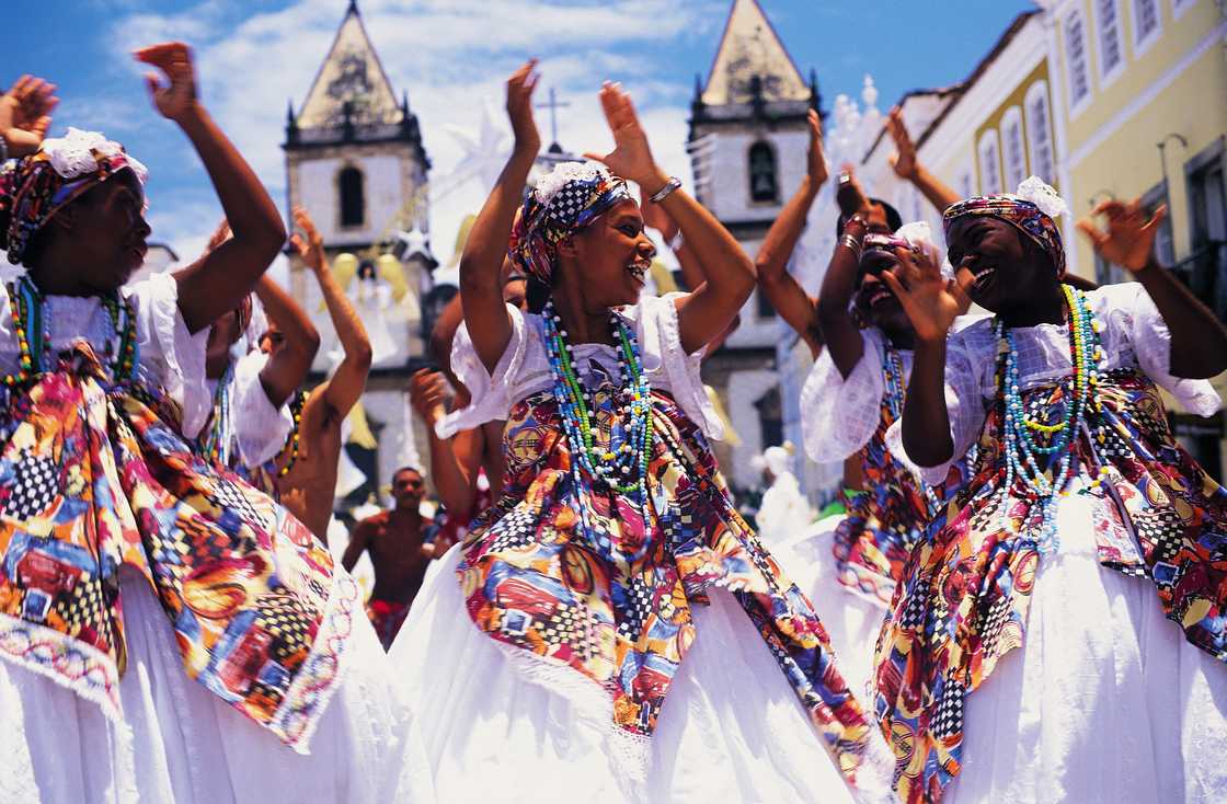 Female dancers dressed in traditional attire Female dancers dressed in traditional attire