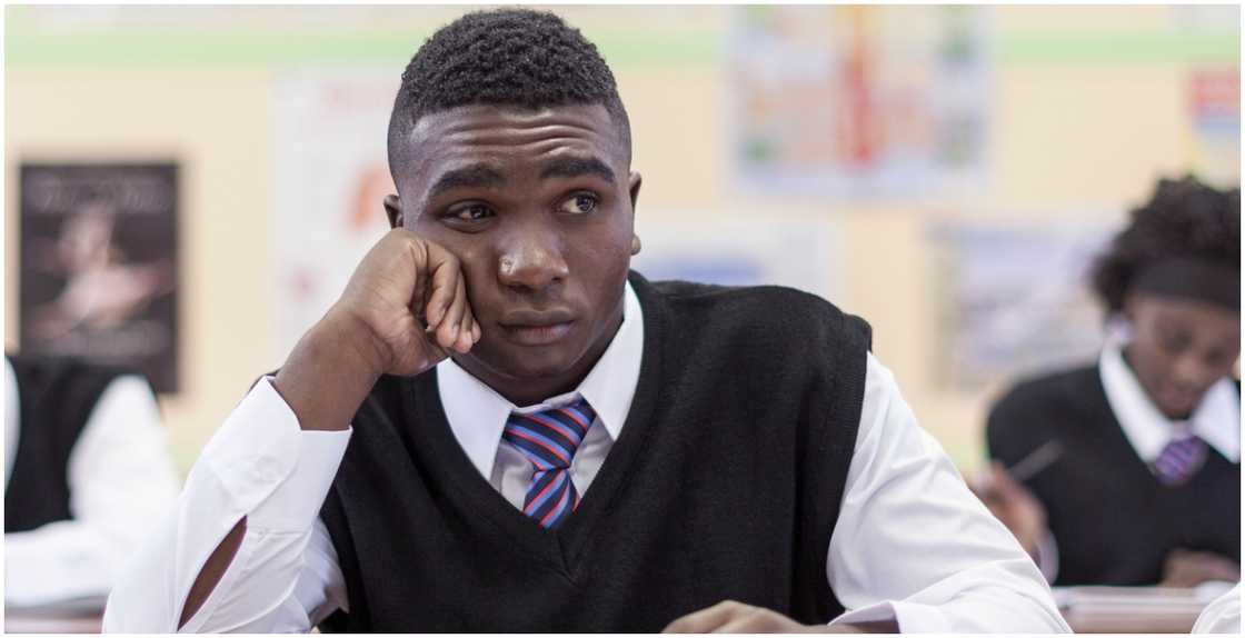 Photo of young student thinking Photo of young student thinking