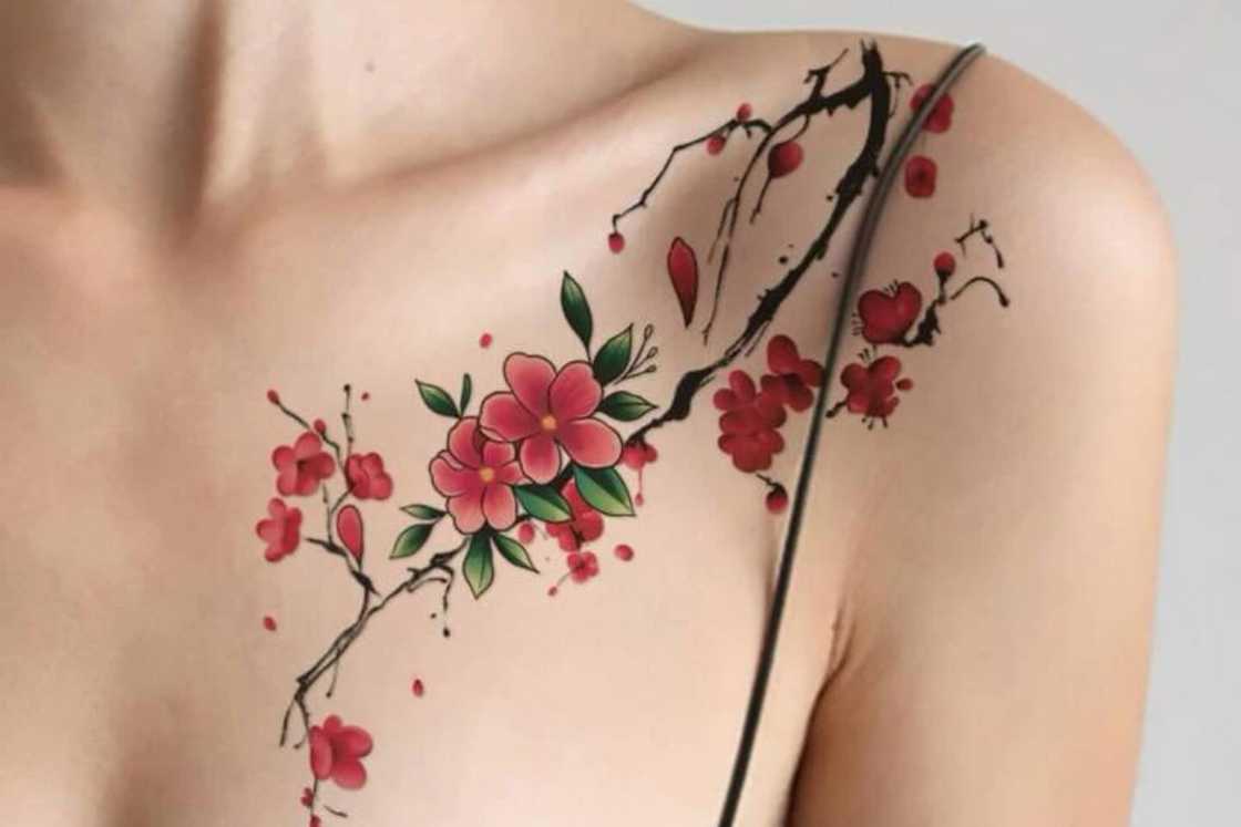 A beautiful cherry blossom shoulder front tattoo A beautiful cherry blossom shoulder front tattoo