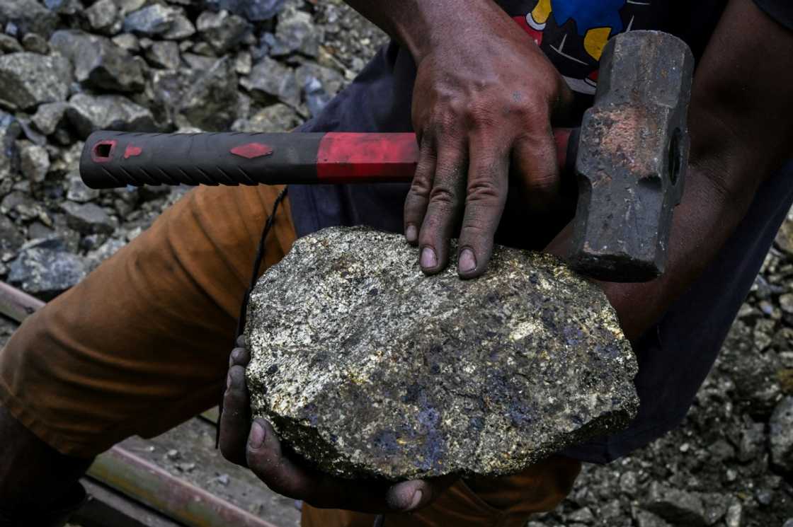 Copper miner Valmir Souza Silva shows off a recent find from one of the 100 or so illegal mines, in Canaa dos Carajas, Para State, Brazil Copper miner Valmir Souza Silva shows off a recent find from one of the 100 or so illegal mines, in Canaa dos Carajas, Para State, Brazil
