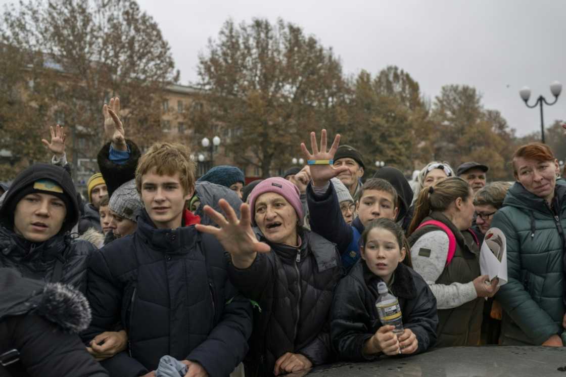 Kherson residents waiting for aid to be distributed following the withdrawal of Russian troops Kherson residents waiting for aid to be distributed following the withdrawal of Russian troops