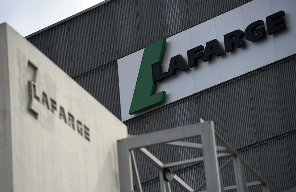 US officials say French cement company Lafarge knowingly made payments to the Islamic State group to build its business in Syria US officials say French cement company Lafarge knowingly made payments to the Islamic State group to build its business in Syria