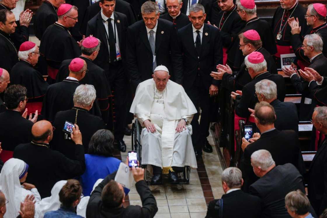 Pope Francis departs after presiding over an evening prayer service at Notre Dame Cathedral in Quebec, Canada, on July 28, 2022 Pope Francis departs after presiding over an evening prayer service at Notre Dame Cathedral in Quebec, Canada, on July 28, 2022