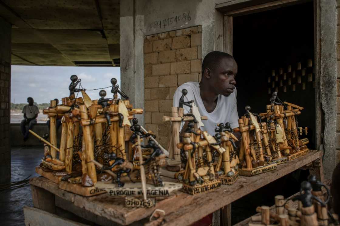 Souvenirs portraying traditional Wagenya life are on sale for the few tourists who visit the impoverished DR Congo area Souvenirs portraying traditional Wagenya life are on sale for the few tourists who visit the impoverished DR Congo area