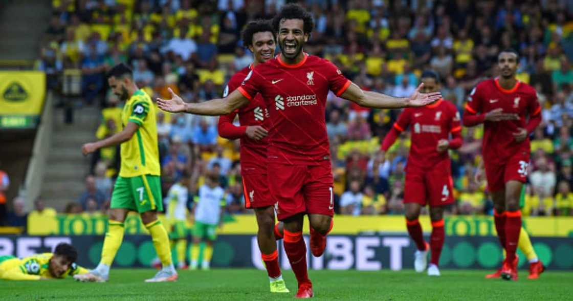 Mohamed Salah of Liverpool celebrates after scoring the third goal during the Premier League match between Norwich City and Liverpool at Carrow Road on August 14, 2021 in Norwich, England. (Photo by John Powell/Liverpool FC via Getty Images) Mohamed Salah of Liverpool celebrates after scoring the third goal during the Premier League match between Norwich City and Liverpool at Carrow Road on August 14, 2021 in Norwich, England. (Photo by John Powell/Liverpool FC via Getty Images)