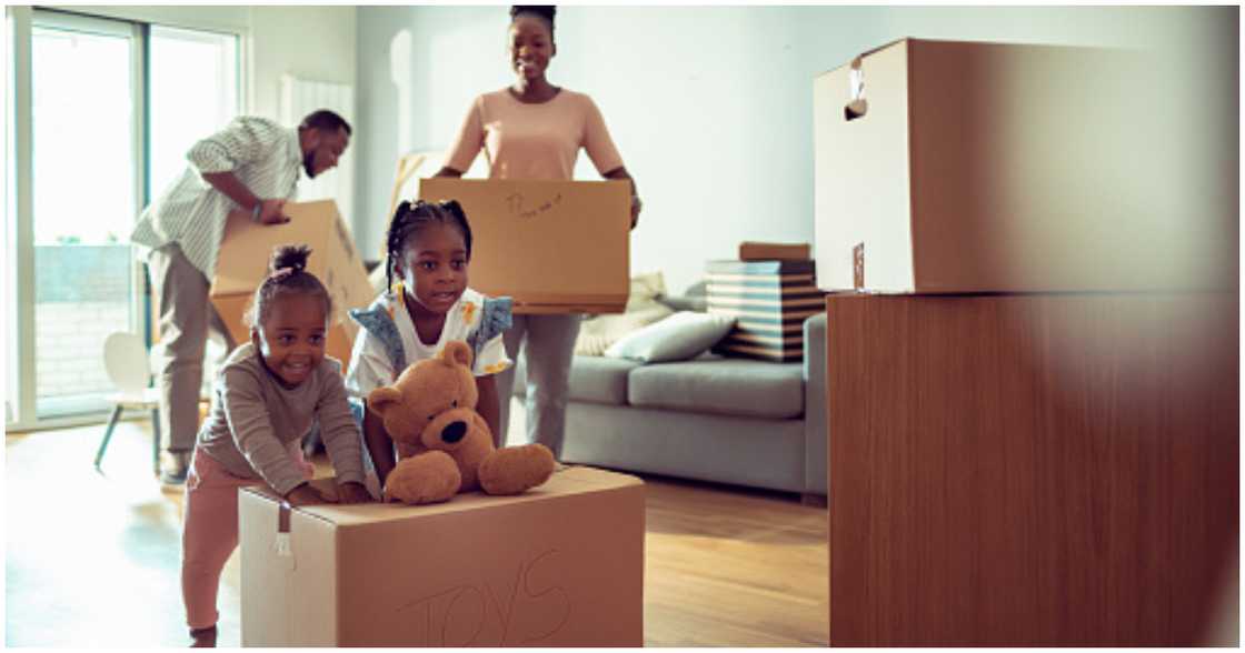 A family moves into a new neighbourhood A family moves into a new neighbourhood