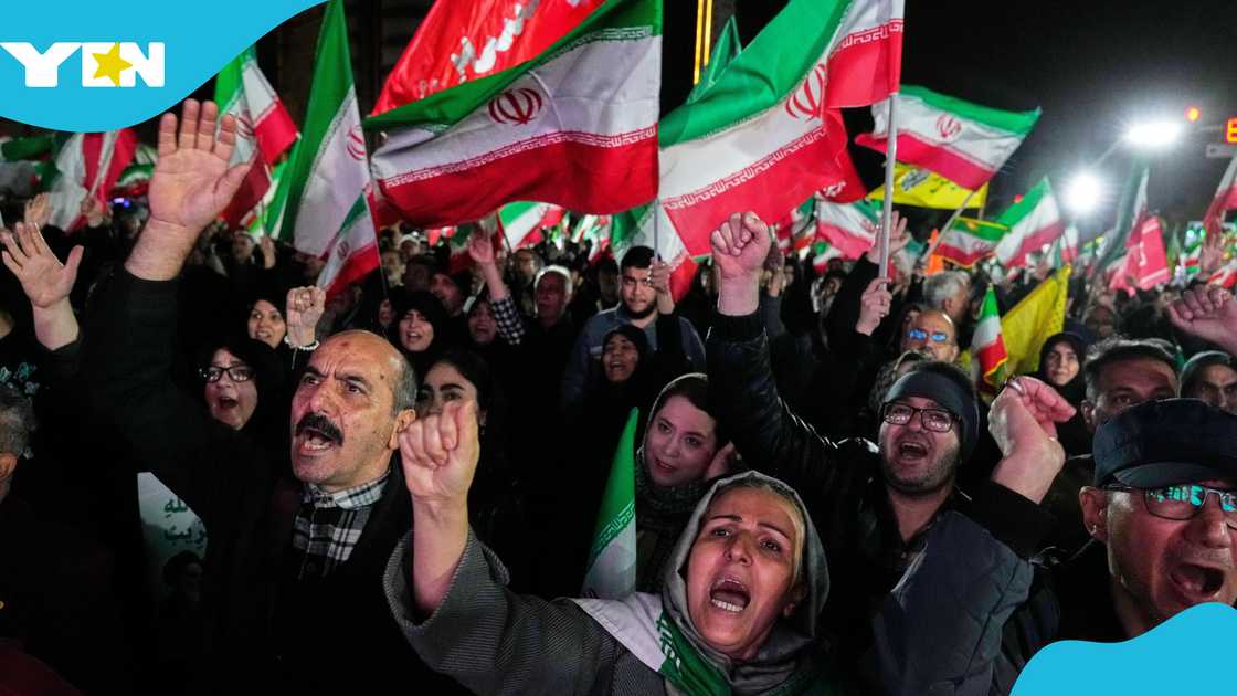 Pro-government supporters chant slogans and wave Iranian flags during a rally in a square in western Tehran, Iran, Wednesday, March 25, 2026. (AP Photo/Vahid Salemi) Pro-government supporters chant slogans and wave Iranian flags during a rally in a square in western Tehran, Iran, Wednesday, March 25, 2026. (AP Photo/Vahid Salemi)