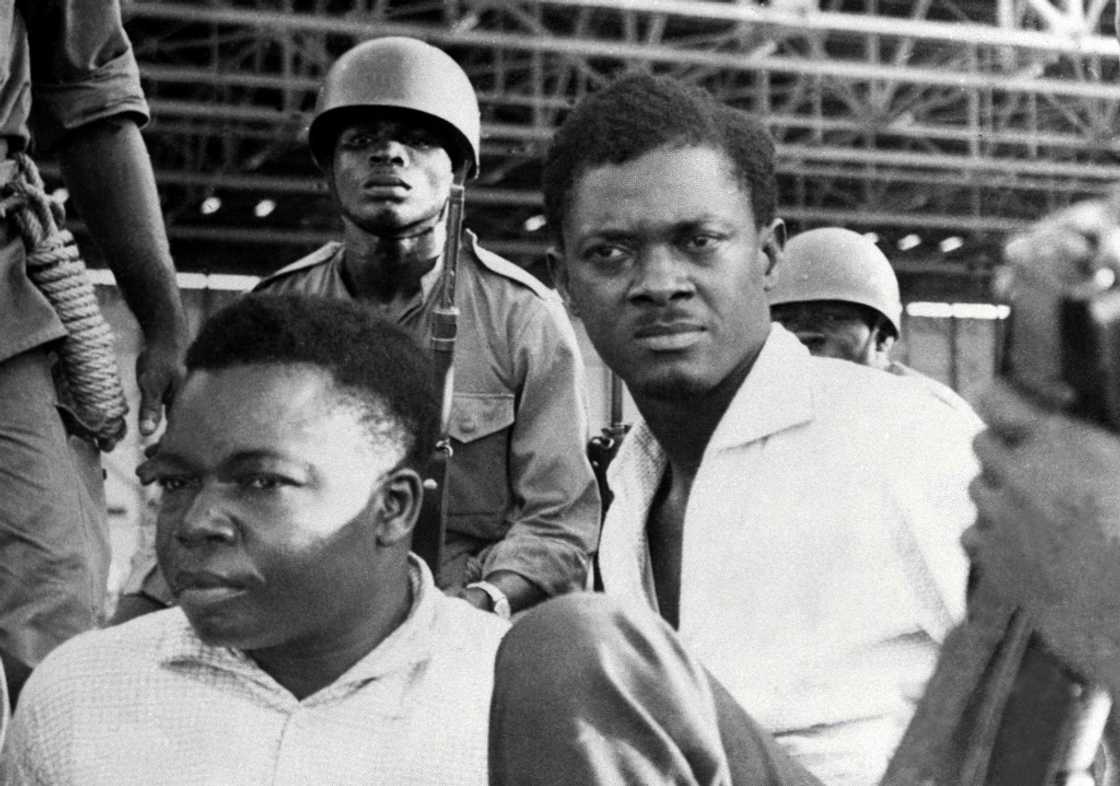 One of the last pictures of Lumumba, right. He and Joseph Okito, left, the vice president of the Senate, were arrested in Leopoldville, now Kinshasa, in December 1960. They were killed the following month