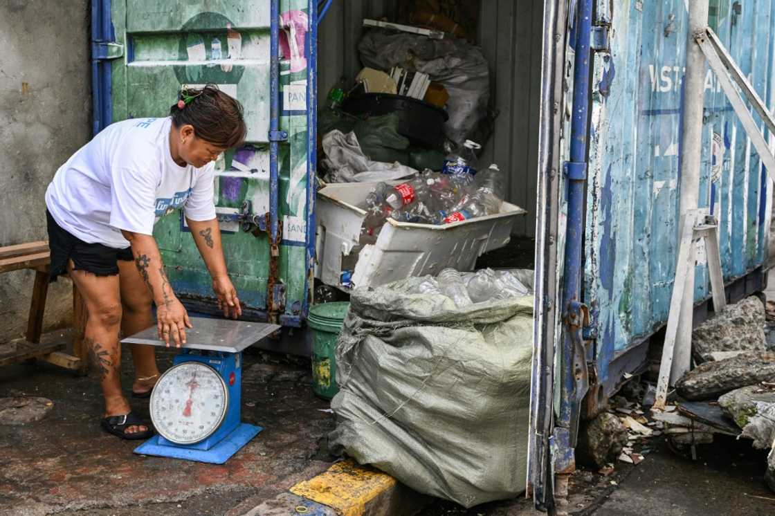 Marita Blanco buys plastic waste for two pesos (3.4 US cents) a kilogram to be resold at a 25 percent markup to US charity Friends of Hope in its waste-to-cash programme Marita Blanco buys plastic waste for two pesos (3.4 US cents) a kilogram to be resold at a 25 percent markup to US charity Friends of Hope in its waste-to-cash programme