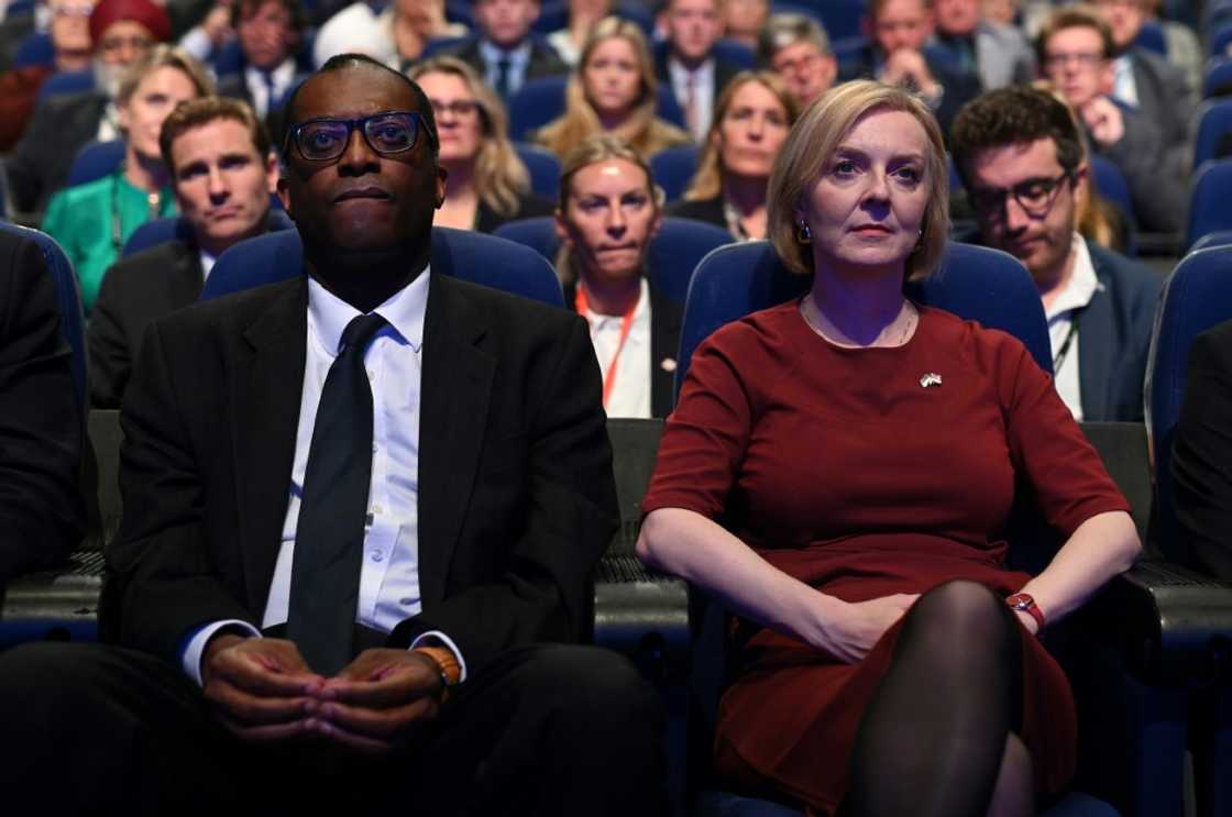 Britain's finance minister Kwasi Kwarteng (L) and Prime Minister Liz Truss have come under fire over their debt-fueled mini-budget Britain's finance minister Kwasi Kwarteng (L) and Prime Minister Liz Truss have come under fire over their debt-fueled mini-budget