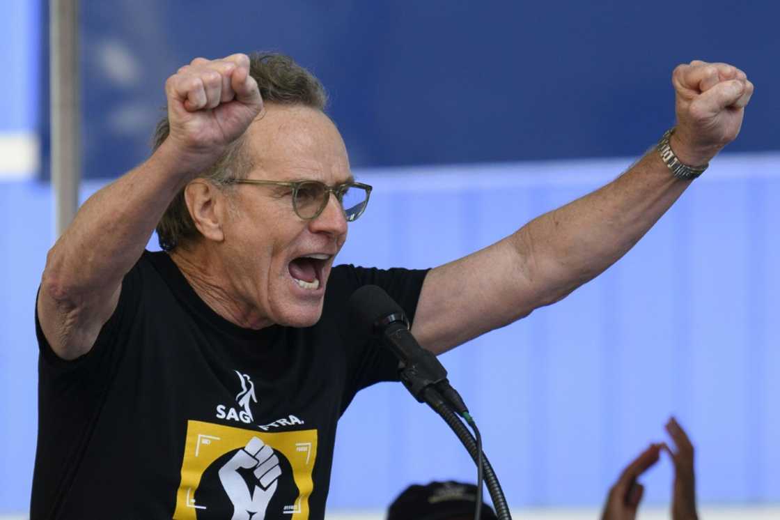 Actor Bryan Cranston speaks at a strike rally in New York's Times Square