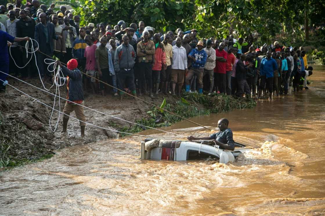 Two rivers burst their banks in the eastern Ugandan city of Mbale, causing widespread damage Two rivers burst their banks in the eastern Ugandan city of Mbale, causing widespread damage