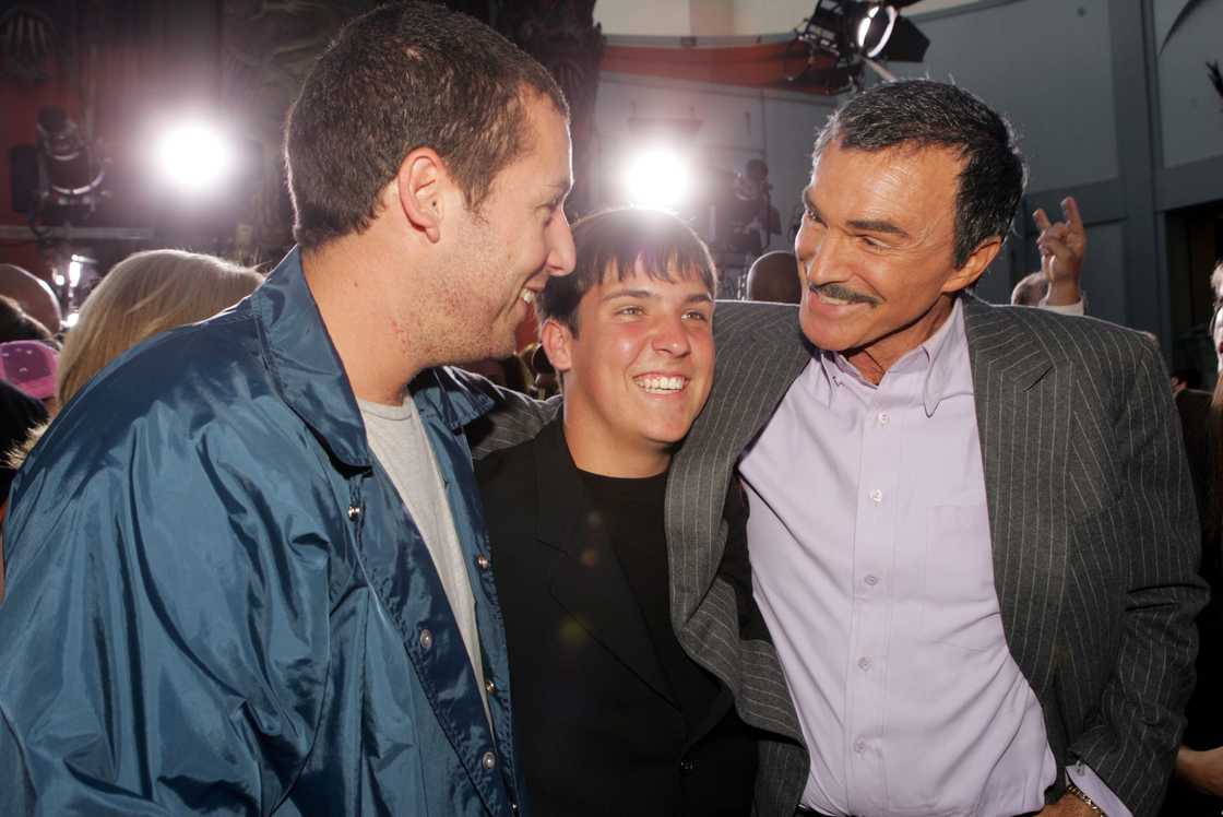 Adam Sandler and Burt Reynolds pose with Quinton at the premiere of Paramount Pictures' "The Longest Yard" at the Chinese Theatre in Los Angeles Adam Sandler and Burt Reynolds pose with Quinton at the premiere of Paramount Pictures' "The Longest Yard" at the Chinese Theatre in Los Angeles