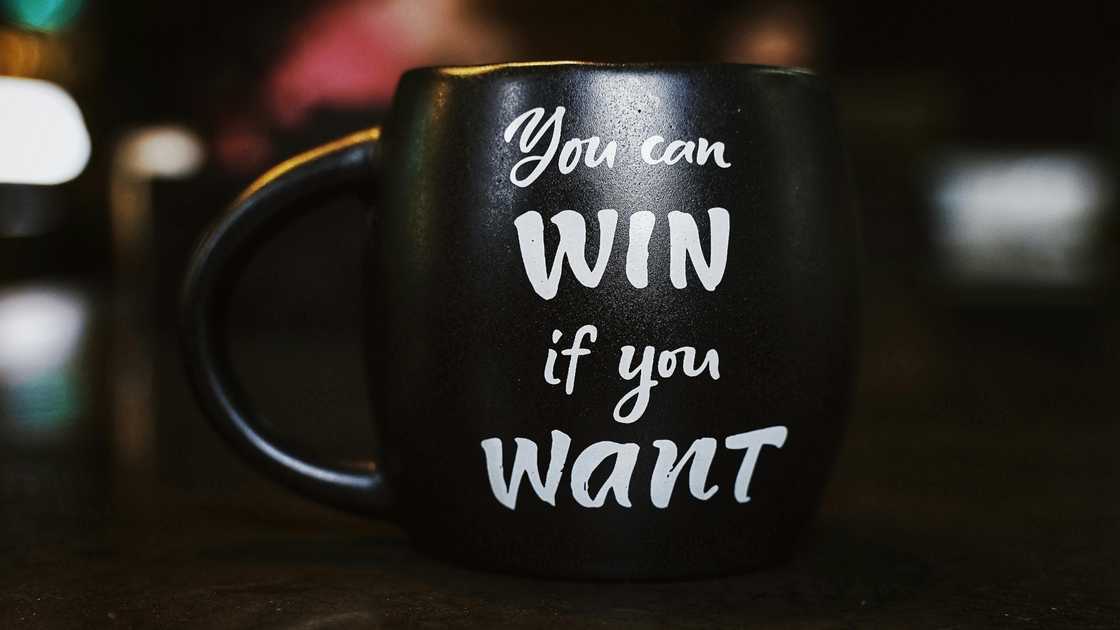 A motivational quote on a cup A motivational quote on a cup