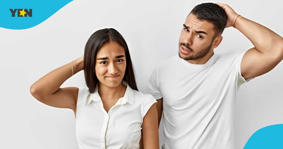 Confused couple scratch their heads Confused couple scratch their heads