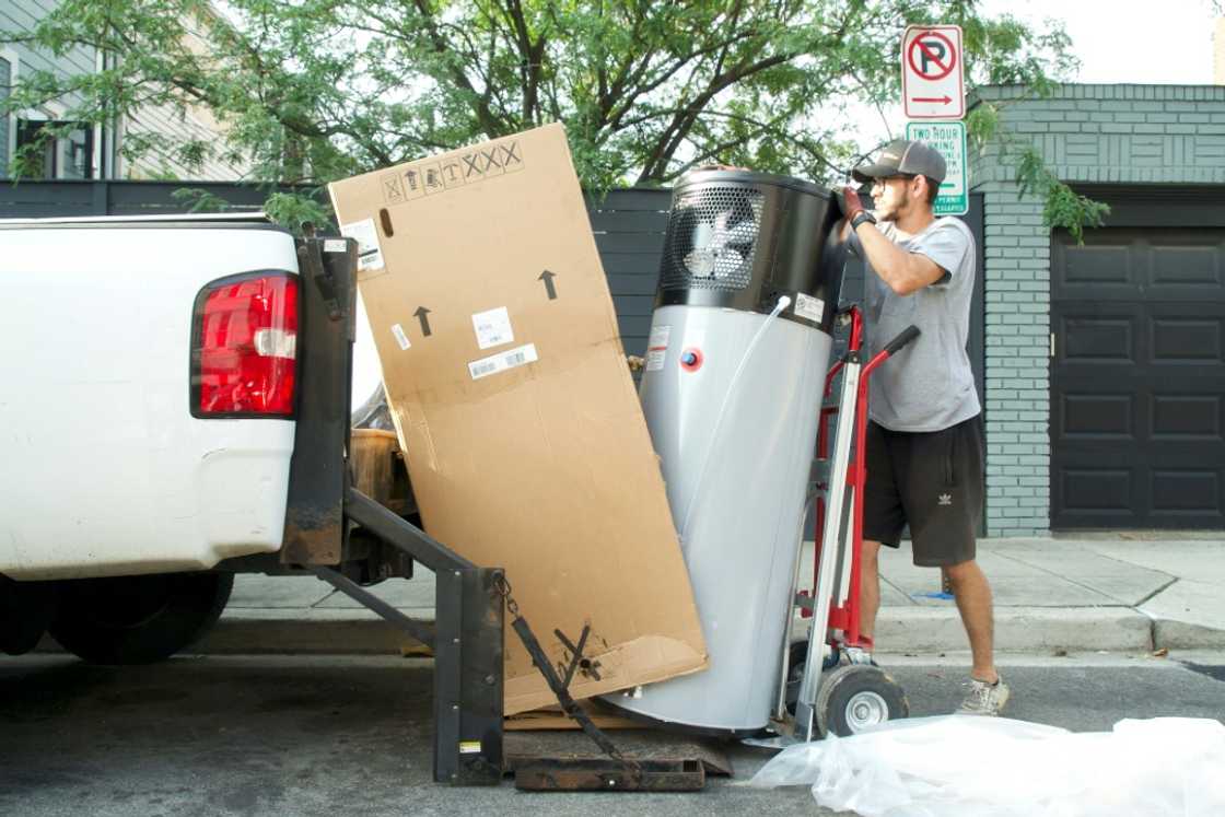 A heat pump water heater unloads at Su Balasubramanian's house