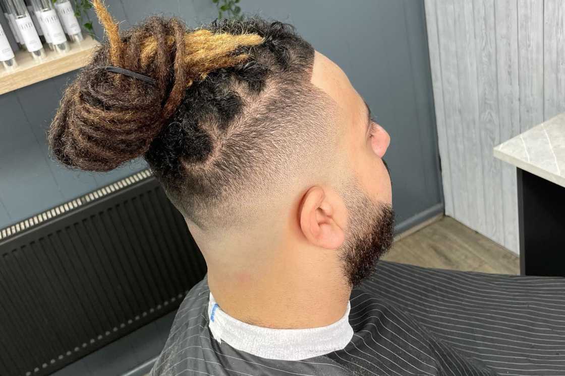 Top-knot dreadlocks with undershave Top-knot dreadlocks with undershave