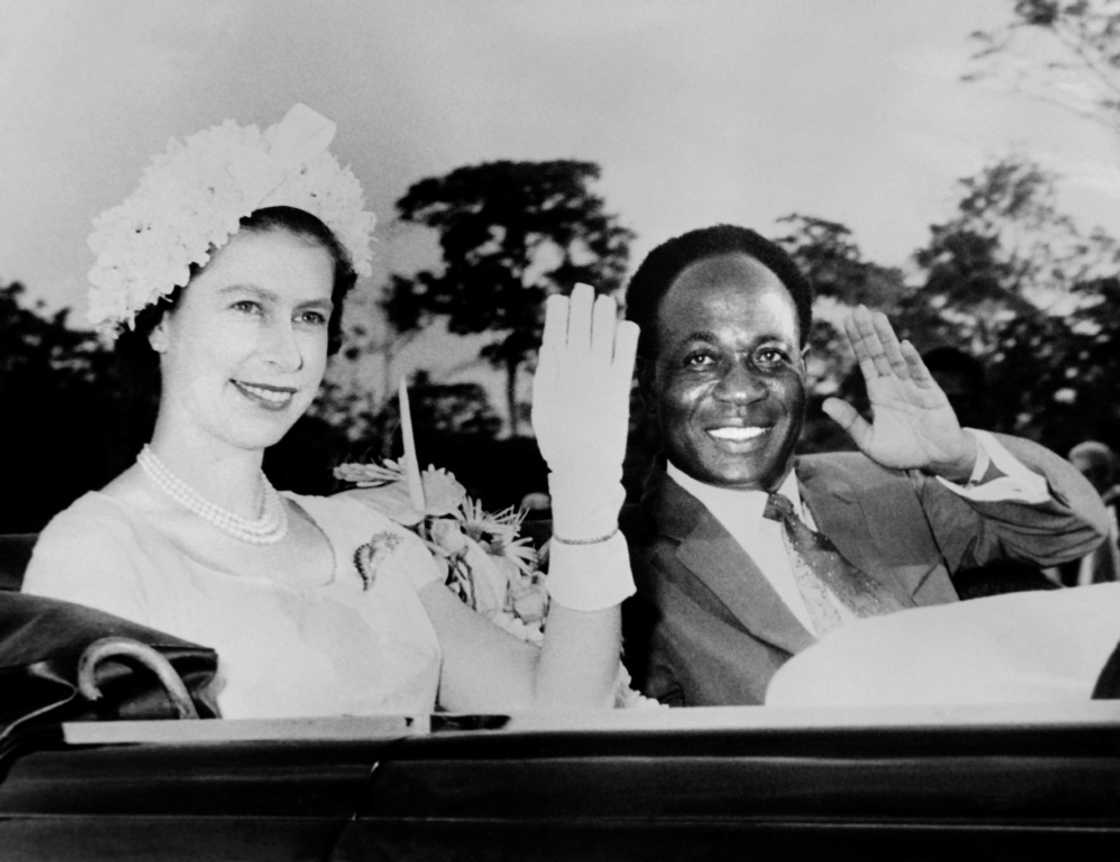 The queen and Ghana's first post-independence president, Kwame Nkrumah, wave to the crowd during a royal visit in 1961 The queen and Ghana's first post-independence president, Kwame Nkrumah, wave to the crowd during a royal visit in 1961