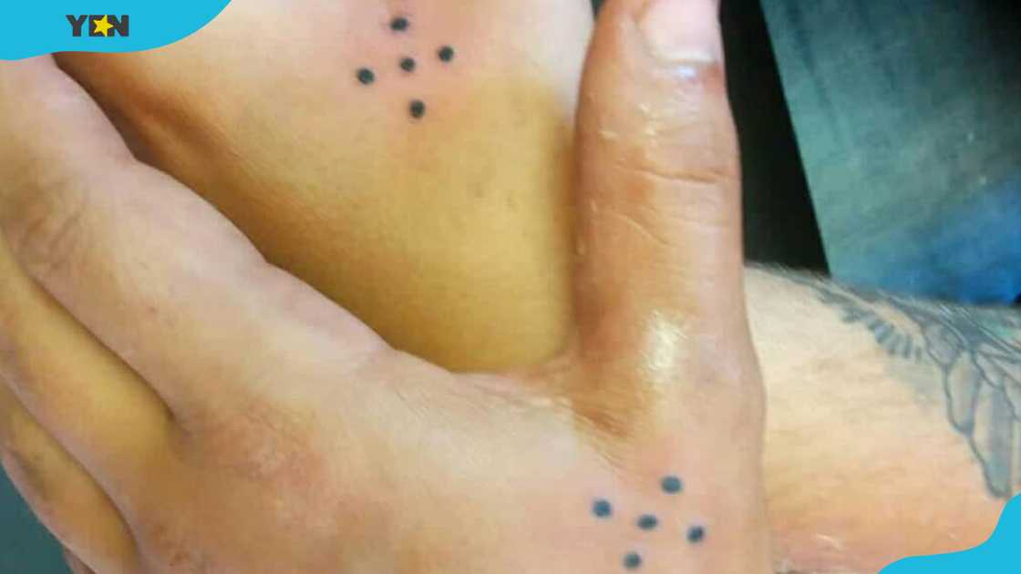 Five dots tattoo