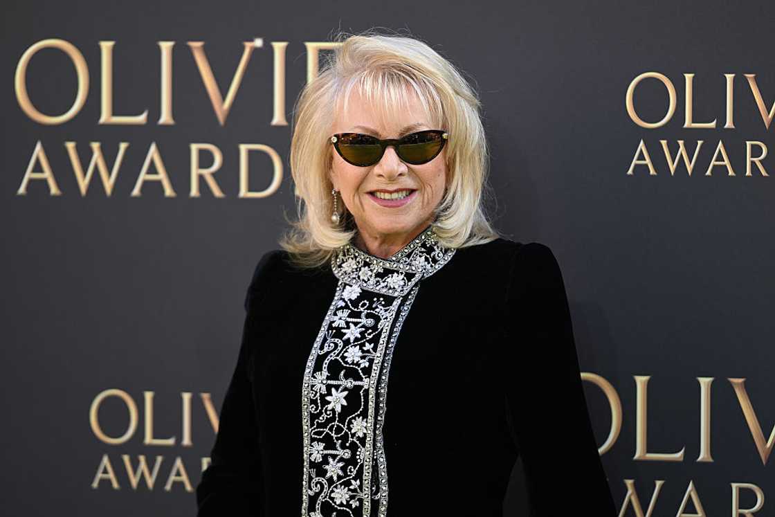 Elaine Paige in a black attire and black glasses Elaine Paige in a black attire and black glasses