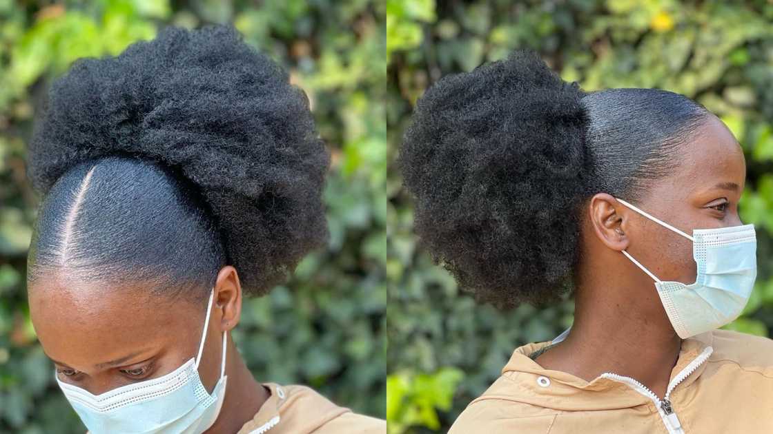 A woman in a face mask and medium-sized kinky ponytail with a middle part A woman in a face mask and medium-sized kinky ponytail with a middle part