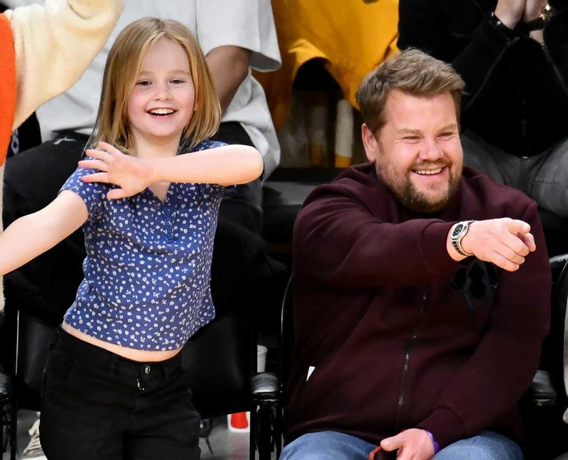 Carey Corden and her dad Max Corden wave at Crypto.com Arena during a game. Carey Corden and her dad Max Corden wave at Crypto.com Arena during a game.