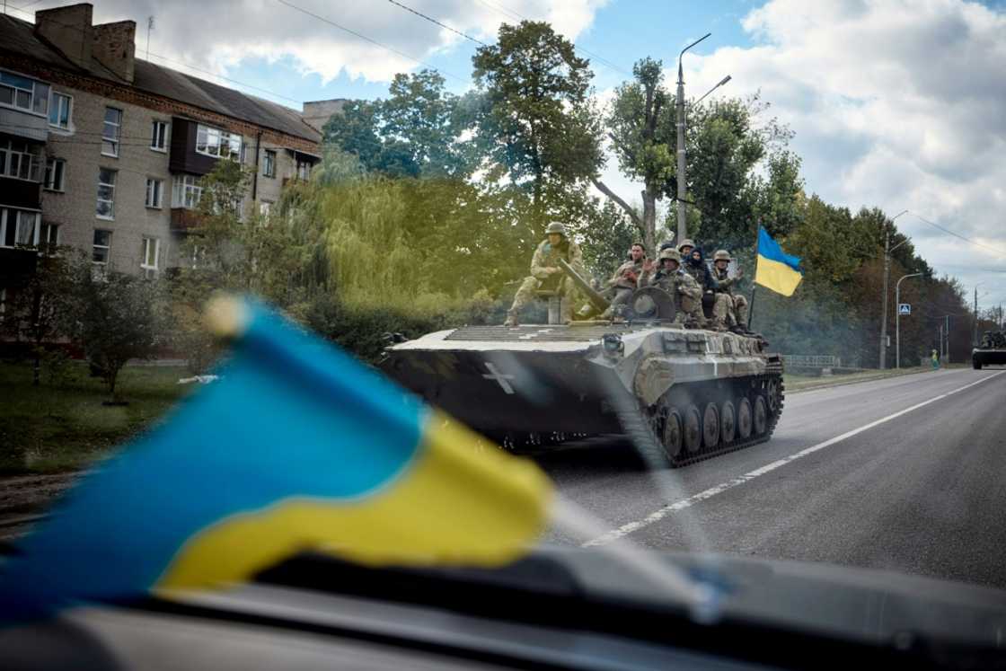 This picture released by Ukraine's Presidential press office shows Ukrainian soldiers on a tank in a street of Kupiansk This picture released by Ukraine's Presidential press office shows Ukrainian soldiers on a tank in a street of Kupiansk