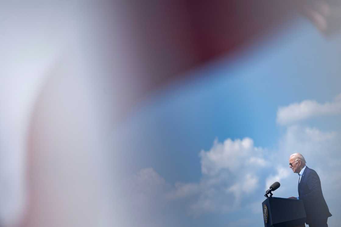 US President Joe Biden delivers remarks at the former location of the Brayton Point Power Station in Somerset, Massachussets, on July 20, 2022, warning that climate change represents a "clear and present danger" to the nation US President Joe Biden delivers remarks at the former location of the Brayton Point Power Station in Somerset, Massachussets, on July 20, 2022, warning that climate change represents a "clear and present danger" to the nation