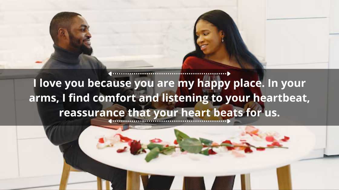 Couple sitting at table, having meal, talking, and laughing Couple sitting at table, having meal, talking, and laughing