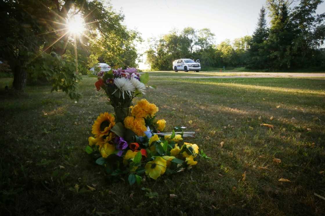 Flowers sit outside the house where one of the stabbing victims was found in Weldon, Saskatchewan, Canada Flowers sit outside the house where one of the stabbing victims was found in Weldon, Saskatchewan, Canada