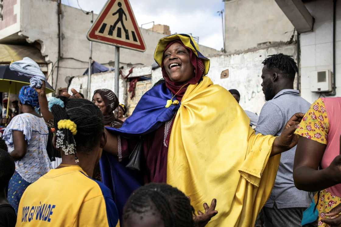 The event sees hundreds of fishermen race through the estuary where the Senegal River meets the Atlantic Ocean