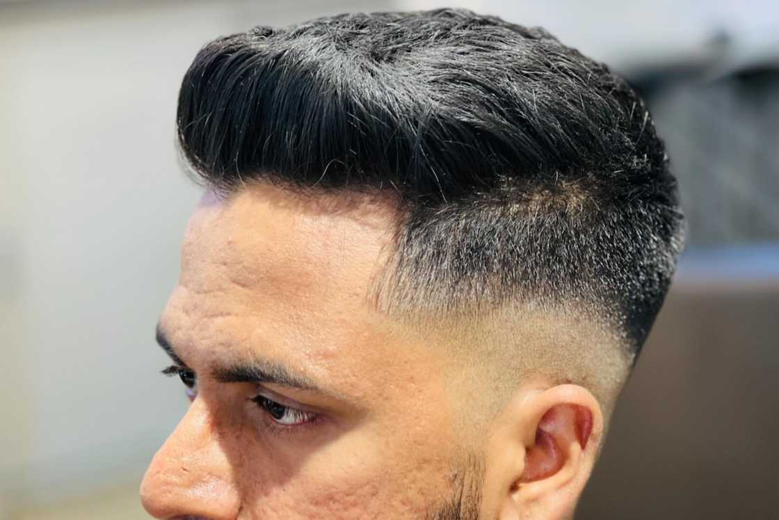 A man with a lovely faux hawk style A man with a lovely faux hawk style