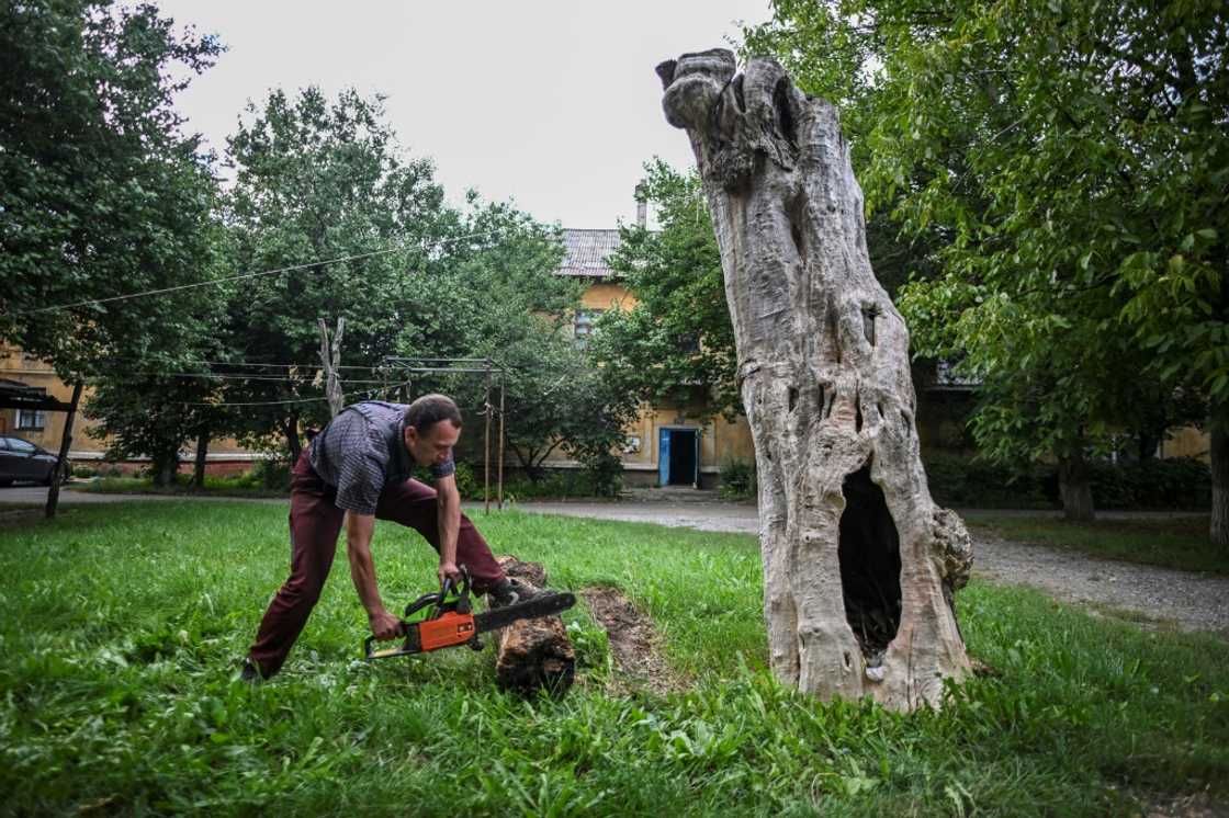 Local are stocking up on wood because gas supplies have been suspended Local are stocking up on wood because gas supplies have been suspended