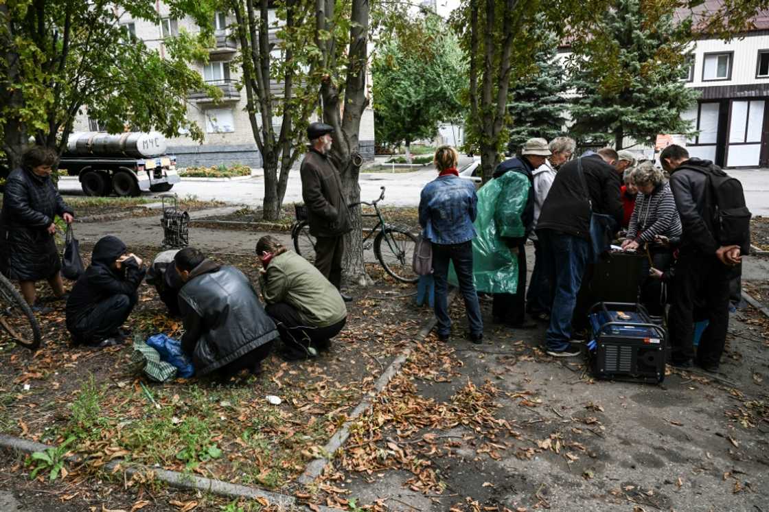 Local people barely pay attention to the mortar shells whistling overhead