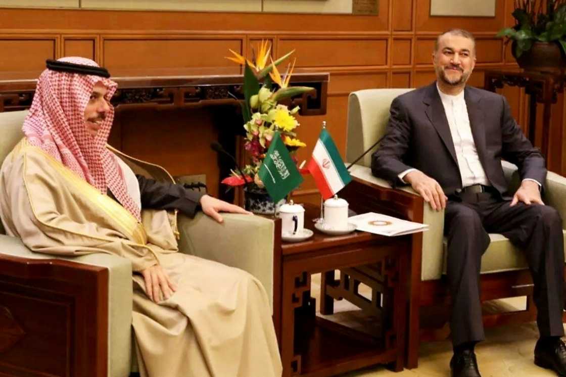 This handout picture provided by the Iranian foreign ministry shows Iran's Foreign Minister Hossein Amir-Abdollahian (R) and Saudi Foreign Affairs Minister Prince Faisal bin Farhan (L) meeting in Beijing on April 6, 2023. The foreign ministers of Middle East rivals Iran and Saudi Arabia met in Beijing, paving the way for normalised ties under a surprise China-brokered deal.