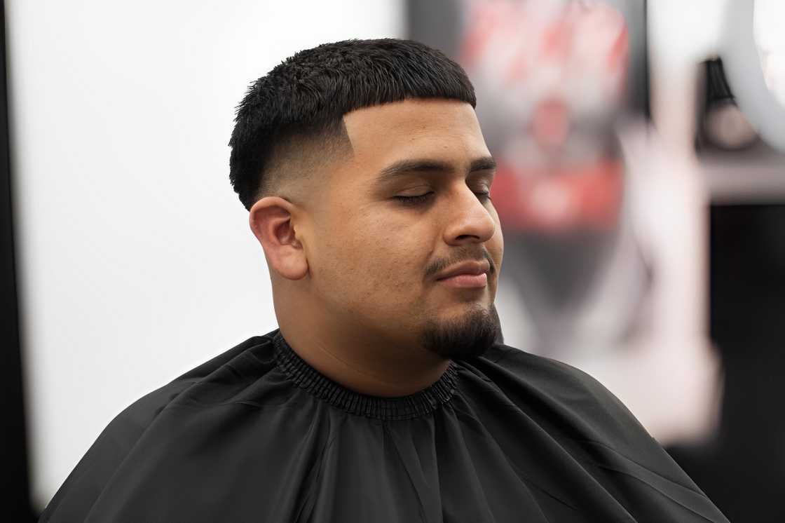 Low fade paired with well-groomed gotee beards Low fade paired with well-groomed gotee beards