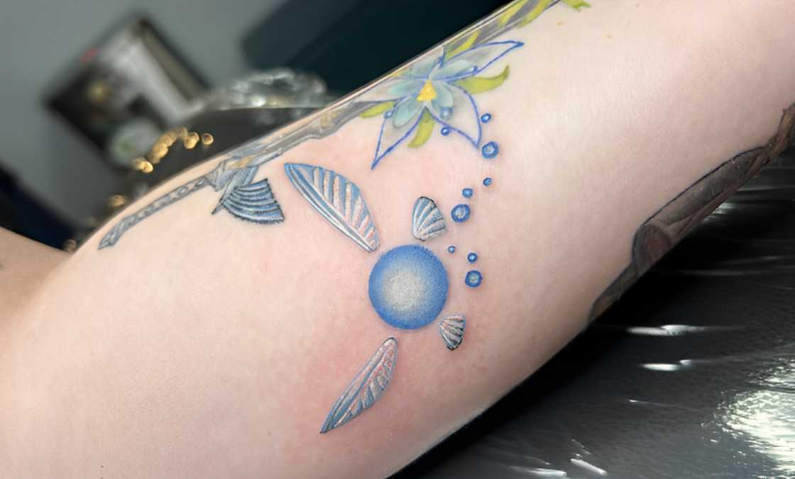 Navi from The Legend of Zelda tattoo Navi from The Legend of Zelda tattoo