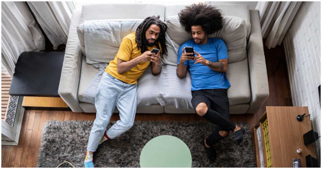 Two roommates spending time together Two roommates spending time together