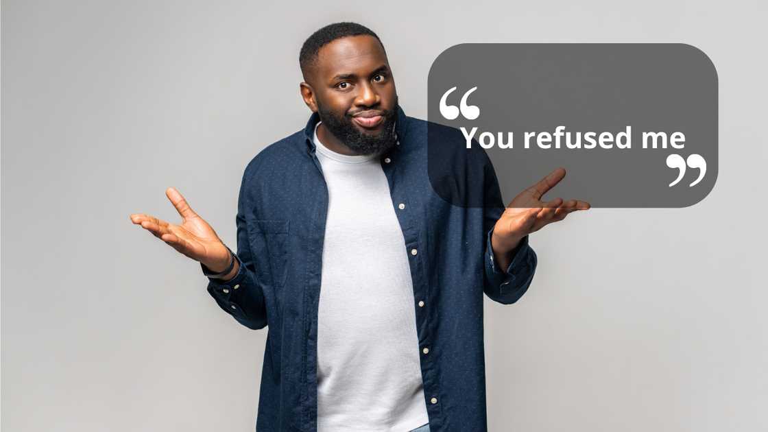 A guy shrugging his shoulders