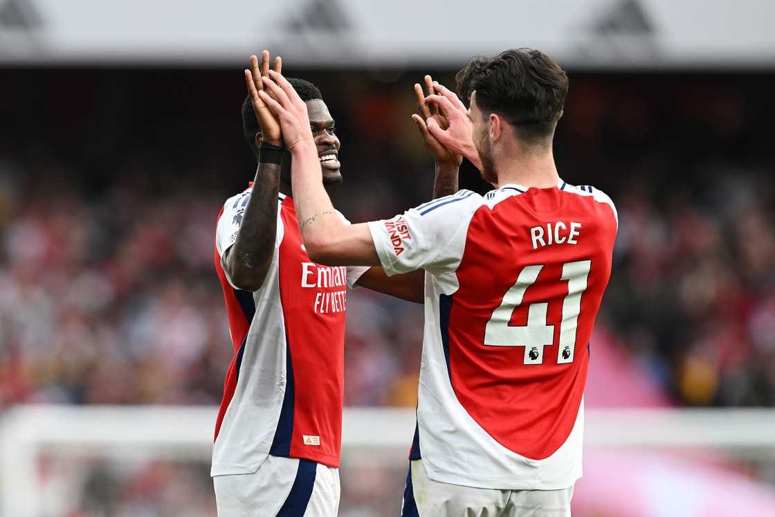 Ghana's Thomas Partey of Arsenal celebrates scoring his team's first goal with teammate Declan Rice during the Premier League match between Arsenal FC and Brentford FC at Emirates Stadium on April 12, 2025 in London, England. Ghana's Thomas Partey of Arsenal celebrates scoring his team's first goal with teammate Declan Rice during the Premier League match between Arsenal FC and Brentford FC at Emirates Stadium on April 12, 2025 in London, England.