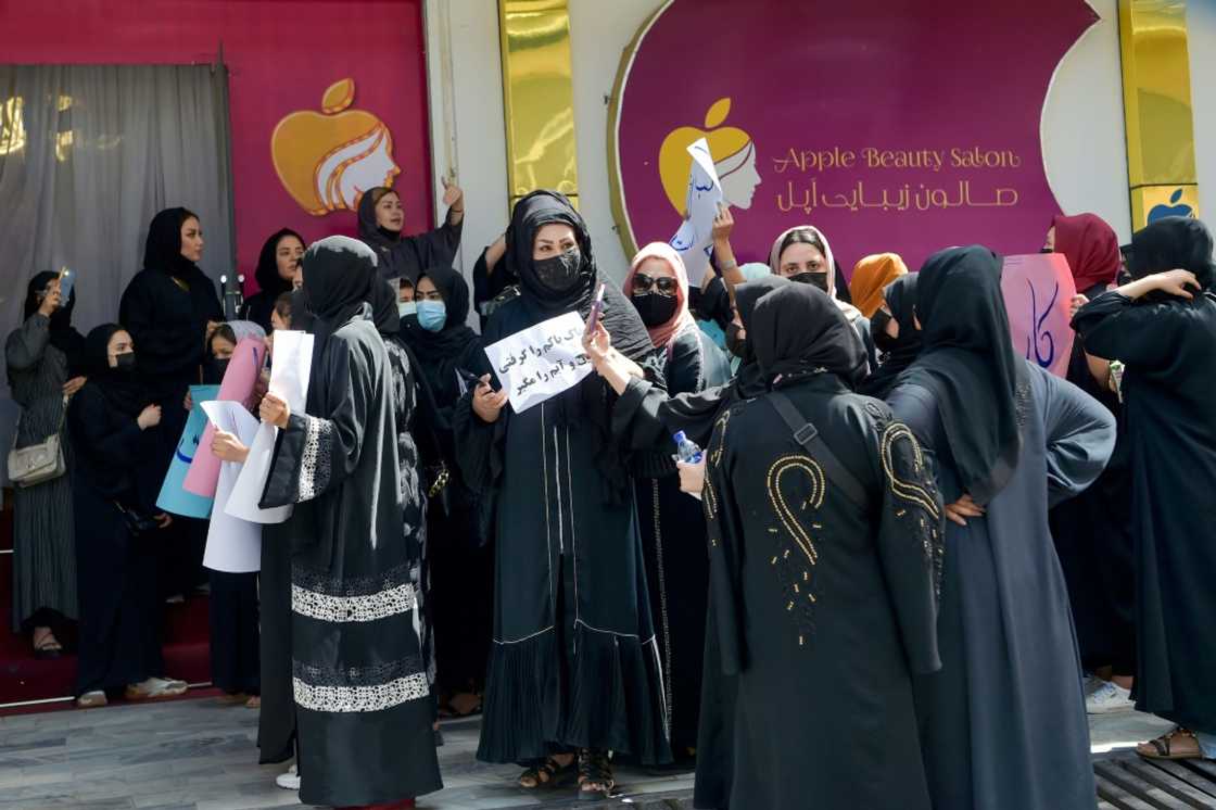 Afghan women stage a protest for their rights at a beauty salon in the Shahr-e-Naw area of Kabul on July 19 Afghan women stage a protest for their rights at a beauty salon in the Shahr-e-Naw area of Kabul on July 19